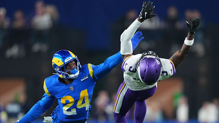 Jan 13, 2025; Glendale, AZ, USA; Minnesota Vikings wide receiver Jordan Addison (3) attempts to make a catch against Los Angeles Rams cornerback Darious Williams (24) during the second half in an NFC wild card game at State Farm Stadium. Mandatory Credit: Joe Camporeale-Imagn Images Jan 13, 2025; Glendale, AZ, USA; Minnesota Vikings wide receiver Jordan Addison (3) attempts to make a catch against Los Angeles Rams cornerback Darious Williams (24) during the second half in an NFC wild card game at State Farm Stadium. Mandatory Credit: Joe Camporeale-Imagn Images