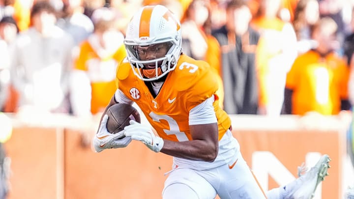 Tennessee wide receiver Squirrel White (3) escapes a tackle during a college football game between Tennessee and UTEP at Neyland Stadium in Knoxville, Tenn., Saturday, Nov. 23, 2024.