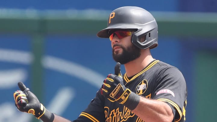Aug 24, 2025; Pittsburgh, Pennsylvania, USA;  Pittsburgh Pirates third baseman Isiah Kiner-Falefa (7) reacts at secbase after hitting an RBI double against the Colorado Rockies during the fourth inning at PNC Park. Mandatory Credit: Charles LeClaire-Imagn Images