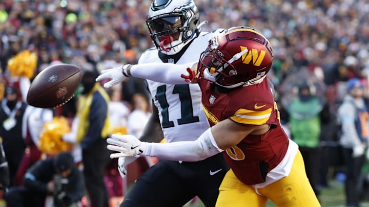 Dec 22, 2024; Landover, Maryland, USA; Washington Commanders cornerback Marshon Lattimore (23) defends a pass intended for Philadelphia Eagles wide receiver A.J. Brown (11) during the first quarter at Northwest Stadium. Dec 22, 2024; Landover, Maryland, USA; Washington Commanders cornerback Marshon Lattimore (23) defends a pass intended for Philadelphia Eagles wide receiver A.J. Brown (11) during the first quarter at Northwest Stadium.