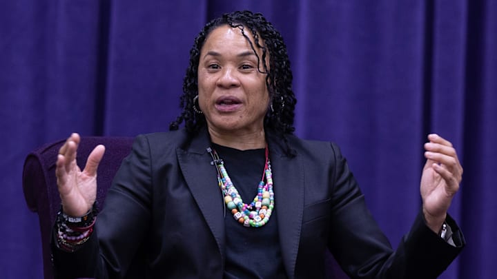 University of South Carolina women's basketball coach Dawn Staley answers a question by moderator Dan Hughes during the University of Mount Union's Schooler Lecture speaker series April 23, 2025, in Alliance, Ohio.