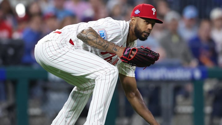 Apr 18, 2026; Philadelphia, Pennsylvania, USA; Philadelphia Phillies pitcher Cristopher Sanchez (61) attempts to field the infield RBI single of Atlanta Braves third baseman Austin Riley (not pictured) during the third inning at Citizens Bank Park. 