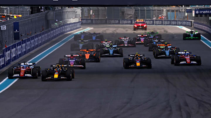 May 4, 2024; Miami Gardens, Florida, USA; Red Bull Racing driver Max Verstappen (1) leads the start of the F1 Sprint Race at Miami International Autodrome. Mandatory Credit: Peter Casey-Imagn Images