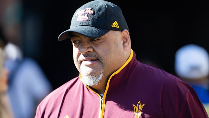 Nov 30, 2024; Tucson, Arizona, USA; Arizona State Sun Devils offensive line coach Saga Tuitele against the Arizona Wildcats during the Territorial Cup at Arizona Stadium. Mandatory Credit: Mark J. Rebilas-Imagn Images Nov 30, 2024; Tucson, Arizona, USA; Arizona State Sun Devils offensive line coach Saga Tuitele against the Arizona Wildcats during the Territorial Cup at Arizona Stadium. Mandatory Credit: Mark J. Rebilas-Imagn Images
