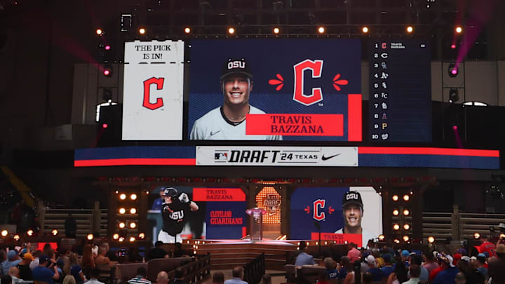 Jul 14, 2024; Ft. Worth, TX, USA; The Cleveland Guardians select Travis Bazzana with the first pick during the first round of the MLB Draft at Cowtown Coliseum. Mandatory Credit: Kevin Jairaj-Imagn Images Jul 14, 2024; Ft. Worth, TX, USA; The Cleveland Guardians select Travis Bazzana with the first pick during the first round of the MLB Draft at Cowtown Coliseum. Mandatory Credit: Kevin Jairaj-Imagn Images