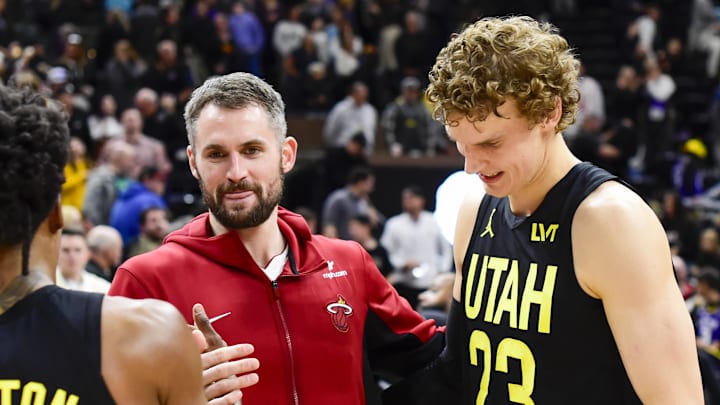 Dec 31, 2022; Salt Lake City, Utah, USA; Miami Heat forward/center Kevin Love (42) congratulates Utah Jazz guard Collin Sexton (2) and forward/center Lauri Markkanen (23) after beating the Miami Heat at Vivint Arena. Mandatory Credit: Christopher Creveling-Imagn Images Dec 31, 2022; Salt Lake City, Utah, USA; Miami Heat forward/center Kevin Love (42) congratulates Utah Jazz guard Collin Sexton (2) and forward/center Lauri Markkanen (23) after beating the Miami Heat at Vivint Arena. Mandatory Credit: Christopher Creveling-Imagn Images