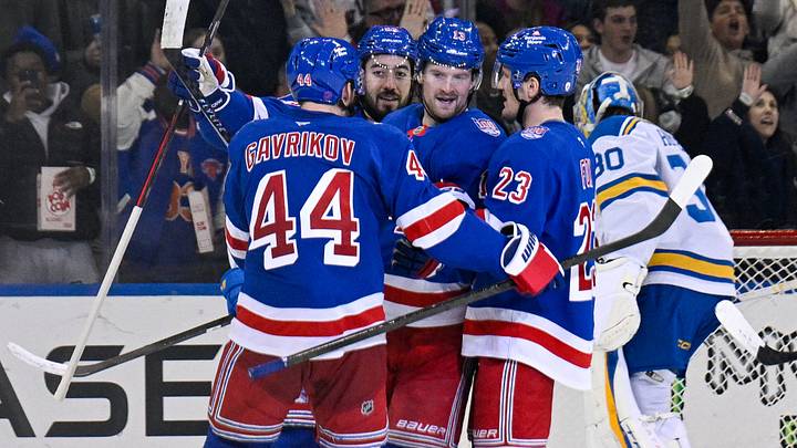 Nov 24, 2025; New York, New York, USA; New York Rangers defenseman Vladislav Gavrikov (44) and New York Rangers defenseman Adam Fox (23) celebrate the goal by New York Rangers left wing Alexis Lafrenière (13) against the St. Louis Blues during the third period at Madison Square Garden. Mandatory Credit: Dennis Schneidler-Imagn Images Nov 24, 2025; New York, New York, USA; New York Rangers defenseman Vladislav Gavrikov (44) and New York Rangers defenseman Adam Fox (23) celebrate the goal by New York Rangers left wing Alexis Lafrenière (13) against the St. Louis Blues during the third period at Madison Square Garden. Mandatory Credit: Dennis Schneidler-Imagn Images
