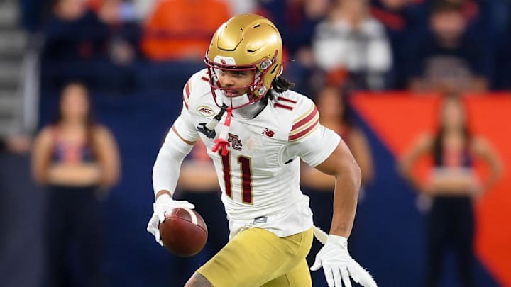 Nov 29, 2025; Syracuse, New York, USA; Boston College Eagles wide receiver Lewis Bond (11) runs against the Syracuse Orange during the second half at the JMA Wireless Dome. Mandatory Credit: Rich Barnes-Imagn Images