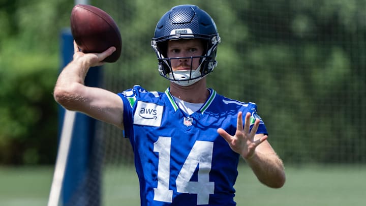 Jun 11, 2025; Renton, WA, USA; Seattle Seahawks quarterback Sam Darnold (14) passes the ball during mini-camp at Virginia Mason Athletic Center. Mandatory Credit: Stephen Brashear-Imagn Images