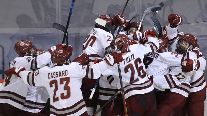 UMass Minutemen celebrate an overtime goal by forward Garrett Wait (12) during overtime in the semifinals of the 2021 Frozen Four NCAA hockey tournament against the Minnesota-Duluth Bulldogs at PPG Paints Arena. UMass Minutemen celebrate an overtime goal by forward Garrett Wait (12) during overtime in the semifinals of the 2021 Frozen Four NCAA hockey tournament against the Minnesota-Duluth Bulldogs at PPG Paints Arena.