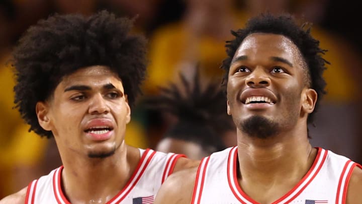Jan 31, 2026; Tempe, Arizona, USA; Arizona Wildcats forward Tobe Awaka (30) and forward Koa Peat (10) against the Arizona State Sun Devils at Desert Financial Arena. Mandatory Credit: Mark J. Rebilas-Imagn Images