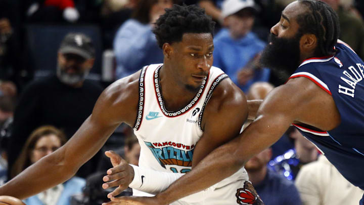 Dec 23, 2024; Memphis, Tennessee, USA; Memphis Grizzlies forward Jaren Jackson Jr. (13) dribbles as Los Angeles Clippers guard James Harden (1) defends during the third quarter at FedExForum. Mandatory Credit: Petre Thomas-Imagn Images