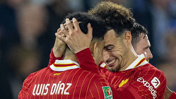 Luis Diaz (left) and Curtis Jones (right) celebrate during Liverpool's victory against Brighton & Hove Albion in the Carabao Cup.