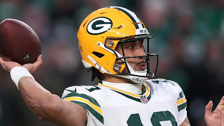 Green Bay Packers quarterback Jordan Love drops back to pass against the Philadelphia Eagles during last year's playoffs.