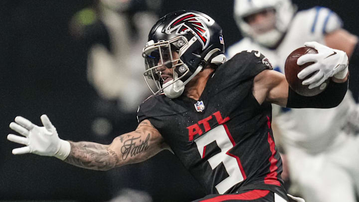 Dec 24, 2023; Atlanta, Georgia, USA; Atlanta Falcons safety Jessie Bates III (3) runs after intercepting a pass against the Indianapolis Colts during the second half at Mercedes-Benz Stadium. Mandatory Credit: Dale Zanine-Imagn Images