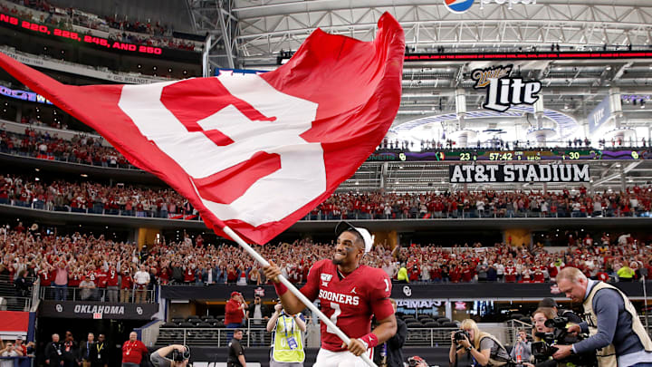 Oklahoma's Jalen Hurts (1) celebrates after the Big 12 Championship Game between the University of Oklahoma Sooners (OU) and the Baylor University Bears at AT&T Stadium in Arlington, Texas, Saturday, Dec. 7, 2019. Oklahoma won 30-23. [Bryan Terry/The Oklahoman]