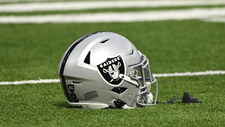 Oct 20, 2024; Inglewood, California, USA; Las Vegas Raiders helmet on the turn at SoFi Stadium during pregame warmups before an NFL game against the Los Angeles Rams. Mandatory Credit: Robert Hanashiro-Imagn Images