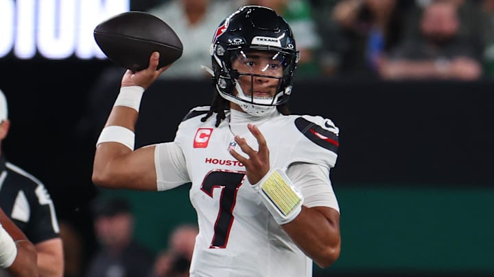 Oct 31, 2024; East Rutherford, New Jersey, USA; Houston Texans quarterback C.J. Stroud (7) throws a pass against the New York Jets during the first half at MetLife Stadium. Mandatory Credit: Ed Mulholland-Imagn Images