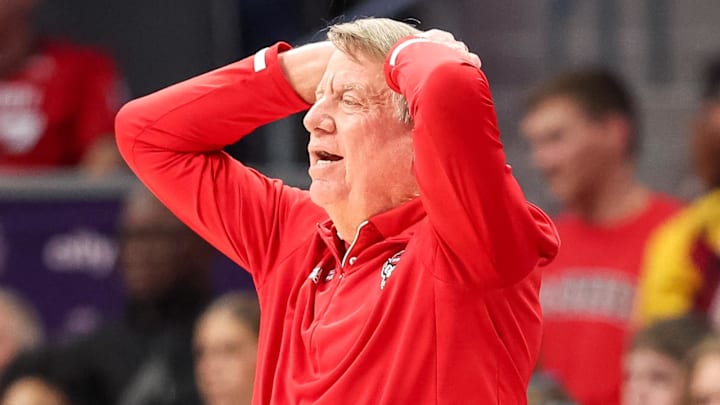 Nov 9, 2025; Charlotte, North Carolina, USA; NC State Wolfpack head coach Wes Moore reacts to a play against the Southern California Trojans during the second quarter of the Ally Tipoff game at Spectrum Center. Mandatory Credit: Cory Knowlton-Imagn Images Nov 9, 2025; Charlotte, North Carolina, USA; NC State Wolfpack head coach Wes Moore reacts to a play against the Southern California Trojans during the second quarter of the Ally Tipoff game at Spectrum Center. Mandatory Credit: Cory Knowlton-Imagn Images