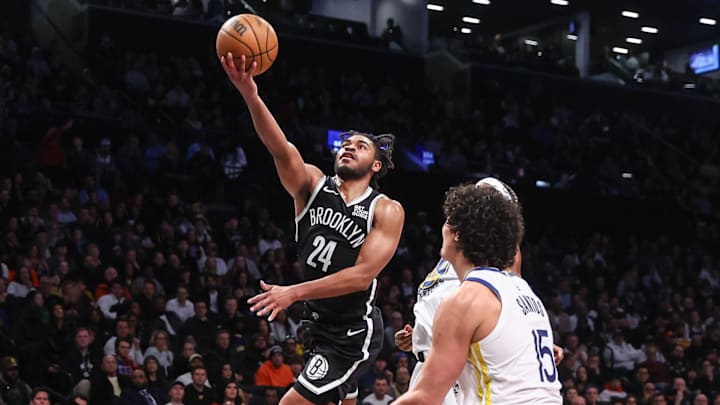 Mar 6, 2025; Brooklyn, New York, USA;  Brooklyn Nets guard Cam Thomas (24) drives to the basket in the third quarter against the Golden State Warriors at Barclays Center. Mandatory Credit: Wendell Cruz-Imagn Images