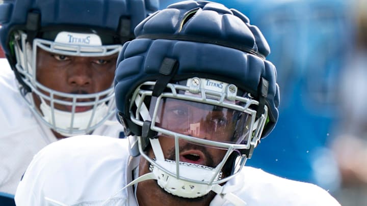 Tennessee Titans outside linebacker Dre'Mont Jones goes through drills during training camp.
