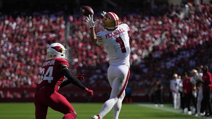 Sep 21, 2025; Santa Clara, California, USA; San Francisco 49ers wide receiver Ricky Pearsall (1) makes the catch inform of Arizona Cardinals safety Jalen Thompson (34) during the second half at Levi's Stadium. Mandatory Credit: Cary Edmondson-Imagn Images Sep 21, 2025; Santa Clara, California, USA; San Francisco 49ers wide receiver Ricky Pearsall (1) makes the catch inform of Arizona Cardinals safety Jalen Thompson (34) during the second half at Levi's Stadium. Mandatory Credit: Cary Edmondson-Imagn Images