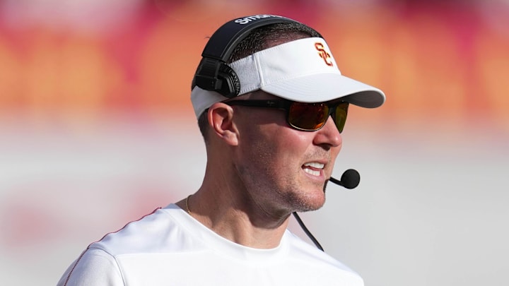 Nov 30, 2024; Los Angeles, California, USA; Southern California Trojans head coach Lincoln Riley reacts against the Notre Dame Fighting Irish in the second half at United Airlines Field at Los Angeles Memorial Coliseum. Mandatory Credit: Kirby Lee-Imagn Images
