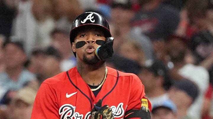 Oct 1, 2026; Cumberland, Georgia, USA;  Atlanta Braves outfielder Ronald Acuna Jr. (13) reacts after hitting a single against the Philadelphia Phillies during the third inning in game three of the Wildcard round for the 2026 MLB Playoffs at Truist Field.  Mandatory Credit: Dale Zanine-Imagn Images