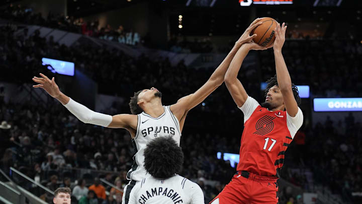 San Antonio Spurs center Victor Wembanyama (1) blocks a shot by Portland Trail Blazers guard Shaedon Sharpe (17) in the first half at Frost Bank Center.