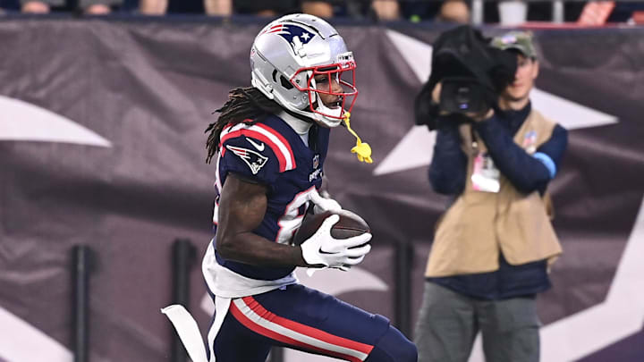 August 8, 2024; Foxborough, MA, USA;  New England Patriots wide receiver JaQuae Jackson (82) scores a touchdown against the Carolina Panthers during the second half at Gillette Stadium. Mandatory Credit: Eric Canha-USA TODAY Sports
