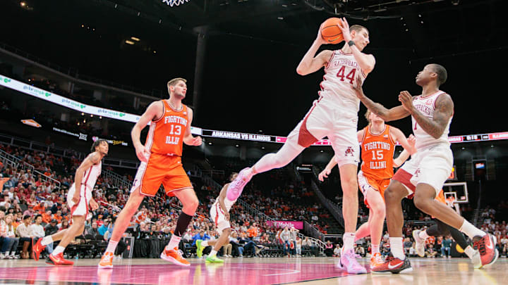 Nov 28, 2024; Kansas City, Missouri, USA; Arkansas Razorbacks forward Zvonimir Ivisic (44) rebounds the ball during the second half against the Illinois Fighting Illini at T-Mobile Center. Mandatory Credit: William Purnell-Imagn Images Nov 28, 2024; Kansas City, Missouri, USA; Arkansas Razorbacks forward Zvonimir Ivisic (44) rebounds the ball during the second half against the Illinois Fighting Illini at T-Mobile Center. Mandatory Credit: William Purnell-Imagn Images