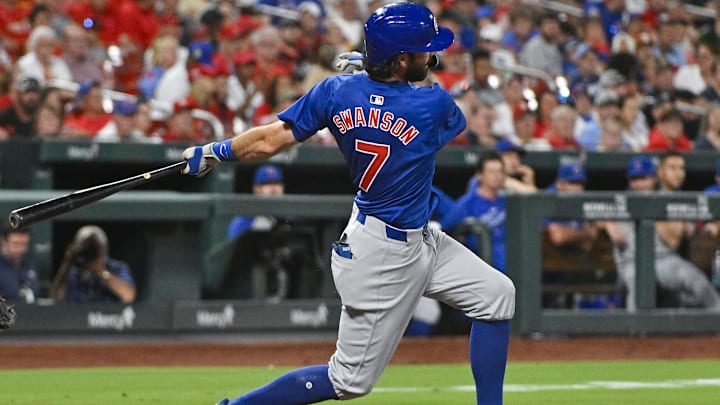 Jul 12, 2024; St. Louis, Missouri, USA;  Chicago Cubs shortstop Dansby Swanson (7) hits a single against the St. Louis Cardinals during the eighth inning at Busch Stadium