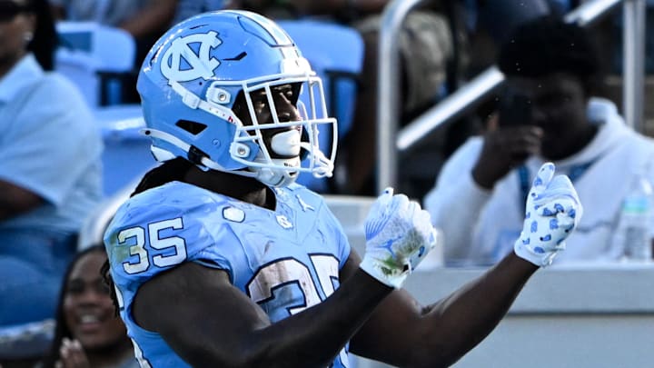 Sep 13, 2025; Chapel Hill, North Carolina, USA; North Carolina Tar Heels running back Demon June (35) celebrates after scoring a touchdown in the fourth quarter at Kenan Stadium. Mandatory Credit: Bob Donnan-Imagn Images Sep 13, 2025; Chapel Hill, North Carolina, USA; North Carolina Tar Heels running back Demon June (35) celebrates after scoring a touchdown in the fourth quarter at Kenan Stadium. Mandatory Credit: Bob Donnan-Imagn Images