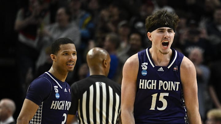 No. 12 seed High Point guard Rob Martin (3) and forward Braden Hausen (15) react during their upset win over five-seed Wisconsin in the first round. They were the highest seed to advance in the NCAA men’s tournament. 