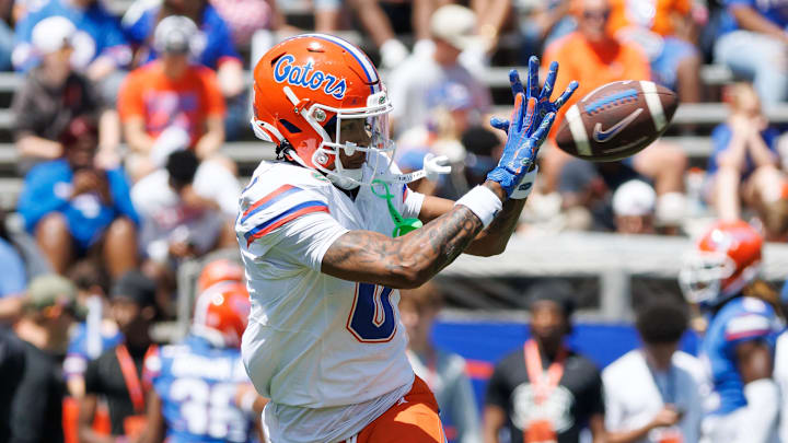 Apr 12, 2025; Gainesville, FL, USA; Florida Gators wide receiver Naeshaun Montgomery (0) catches a pass before the game at Ben Hill Griffin Stadium. Mandatory Credit: Matt Pendleton-Imagn Images