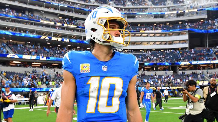 Oct 5, 2025; Inglewood, California, USA; Los Angeles Chargers quarterback Justin Herbert (10) reacts after the game against the Washington Commanders at SoFi Stadium. Mandatory Credit: Gary A. Vasquez-Imagn Images