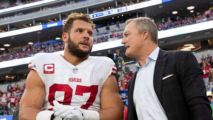 San Francisco 49ers edge Nick Bosa (L) and general manager John Lynch (R)