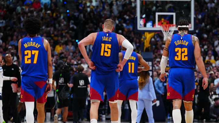 Apr 20, 2026; Denver, Colorado, USA; Denver Nuggets guard Jamal Murray (27), center Nikola Jokic (15) and forward Aaron Gordon (32) in the fourth quarter against the Minnesota Timberwolves during game two of the first round of the 2026 NBA Playoffs at Ball Arena. Mandatory Credit: Ron Chenoy-Imagn Images