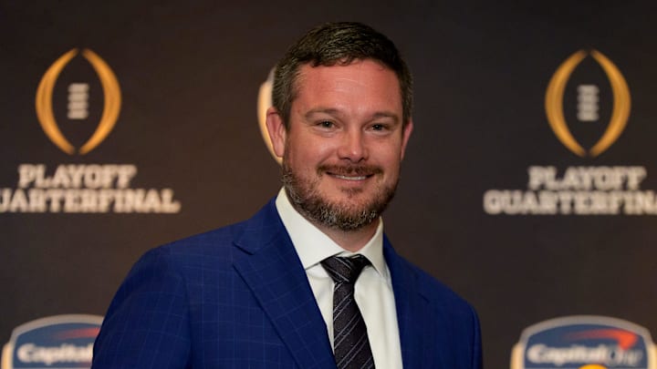Oregon head coach Dan Lanning holds an orange during the head coaches press conference ahead of Orange Bowl on Dec. 31, 2025, in Dania Beach, Florida.