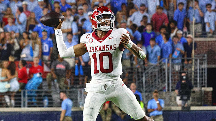 Sep 13, 2025; Oxford, Mississippi, USA; Arkansas Razorback quarterback Taylen Green (10) passes the ball during the second quarter against the Mississippi Rebels at Vaught-Hemingway Stadium. Mandatory Credit: Petre Thomas-Imagn Images
