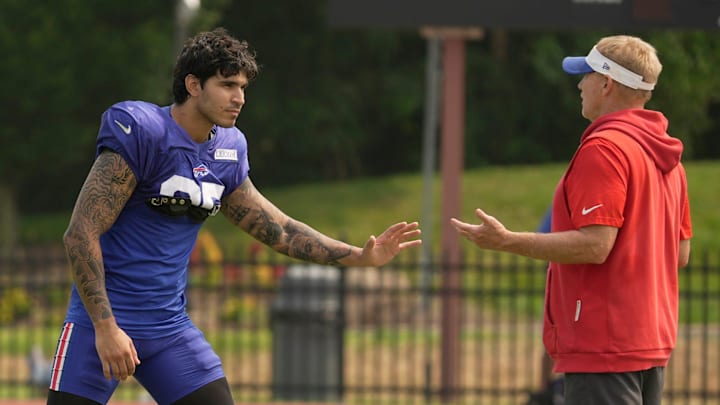 Buffalo Bills linebacker Jimmy Ciarlo and special teams coordinator Chris Tabor.
