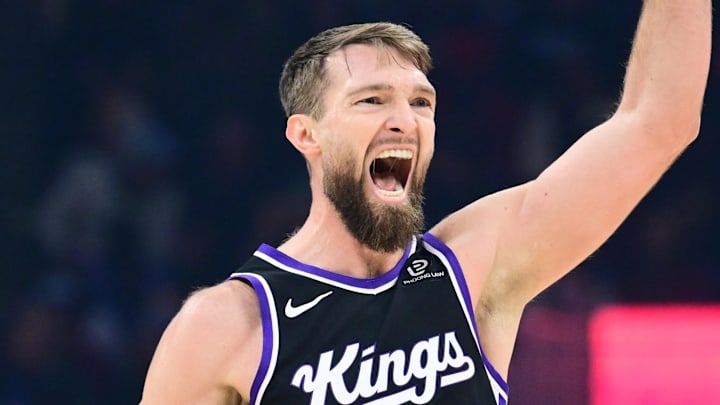Jan 23, 2026; Cleveland, Ohio, USA; Sacramento Kings forward Domantas Sabonis (11) celebrates after hitting a three point basket against the Cleveland Cavaliers during the first half at Rocket Arena. Mandatory Credit: Ken Blaze-Imagn Images