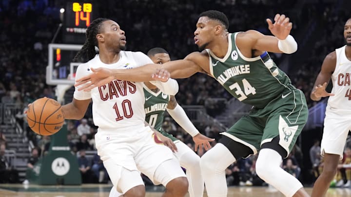 Nov 2, 2024; Milwaukee, Wisconsin, USA; Cleveland Cavaliers guard Darius Garland (10) drives to the basket against Milwaukee Bucks forward Giannis Antetokounmpo (34) in the first half at Fiserv Forum. Mandatory Credit: Michael McLoone-Imagn Images