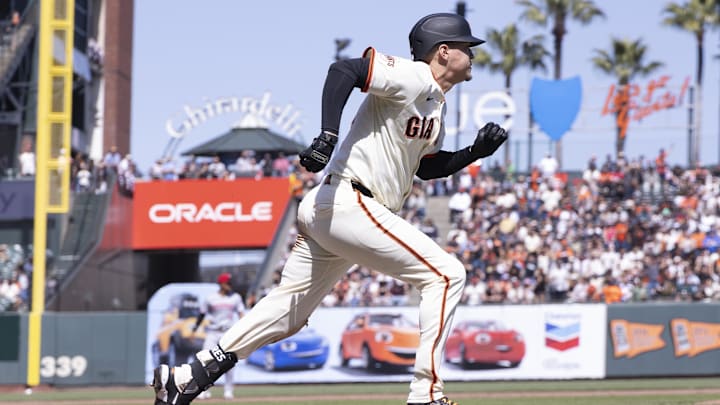 Apr 9, 2025; San Francisco, California, USA; San Francisco Giants designated hitter Wilmer Flores (41) runs for first base for an RBI single against the Cincinnati Reds during the sixth inning at Oracle Park. 