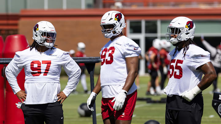 Jun 10, 2025; Tempe, AZ, USA; Arizona Cardinals defensive lineman Walter Nolen III (97) talks with Calais Campbell (93) and Dante Stills (55) during minicamp at the teams Arizona Cardinals Training Facility. Mandatory Credit: Mark J. Rebilas-Imagn Images Jun 10, 2025; Tempe, AZ, USA; Arizona Cardinals defensive lineman Walter Nolen III (97) talks with Calais Campbell (93) and Dante Stills (55) during minicamp at the teams Arizona Cardinals Training Facility. Mandatory Credit: Mark J. Rebilas-Imagn Images