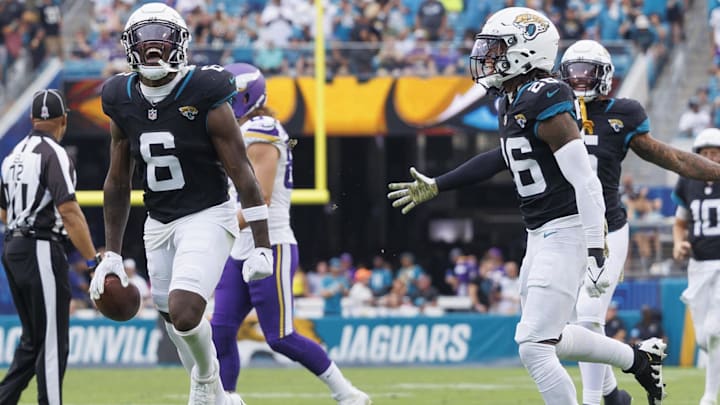 Nov 10, 2024; Jacksonville, Florida, USA; Jacksonville Jaguars safety Darnell Savage (6) celebrates an interception with safety Antonio Johnson (26) against the Minnesota Vikings during the third quarter at EverBank Stadium. Mandatory Credit: Morgan Tencza-Imagn Images Nov 10, 2024; Jacksonville, Florida, USA; Jacksonville Jaguars safety Darnell Savage (6) celebrates an interception with safety Antonio Johnson (26) against the Minnesota Vikings during the third quarter at EverBank Stadium. Mandatory Credit: Morgan Tencza-Imagn Images