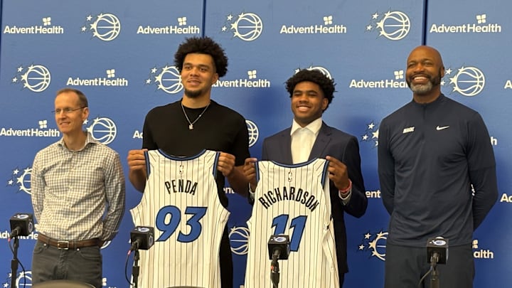 June 27, 2025: Jase Richardson and Noah Penda pose with Orlando Magic president of basketball operations Jeff Weltman and head coach Jamahl Mosley at an introductory Press Conference. June 27, 2025: Jase Richardson and Noah Penda pose with Orlando Magic president of basketball operations Jeff Weltman and head coach Jamahl Mosley at an introductory Press Conference.