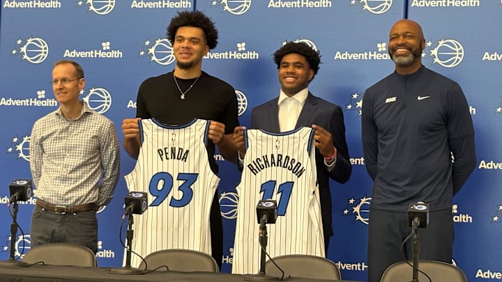 June 27, 2025: Jase Richardson and Noah Penda pose with Orlando Magic president of basketball operations Jeff Weltman and head coach Jamahl Mosley at an introductory Press Conference. 