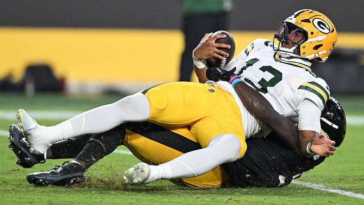 Pittsburgh Steelers linebacker Jamin Davis (50) sacks Green Bay Packers quarterback Kyron Drones. Pittsburgh Steelers linebacker Jamin Davis (50) sacks Green Bay Packers quarterback Kyron Drones.