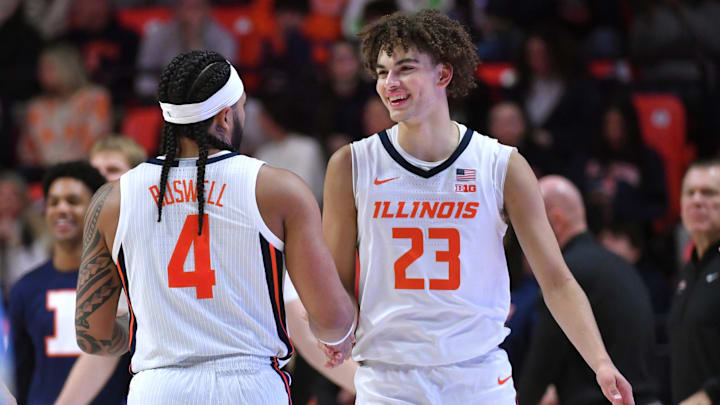 Dec 29, 2025; Champaign, Illinois, USA;  Illinois Fighting Illini guard Keaton Wagler (23) and teammate Kylan Boswell (4) react in the closing minutes of the second half against the Southern University Jaguars  at State Farm Center. Mandatory Credit: Ron Johnson-Imagn Images